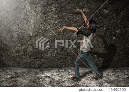 Spooky zombie man with hands for clawing Spooky zombie man with hands for clawing 43499293