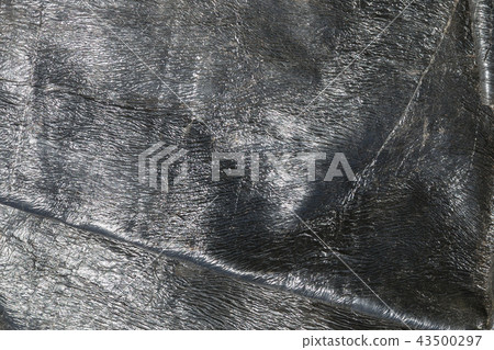 Abstract texture of tar paper under the sun Abstract texture of tar paper under the sun 43500297