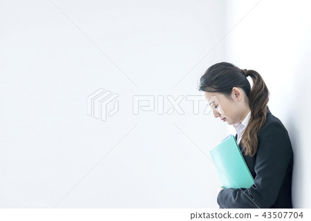 Ugly business woman holding a file 43507704