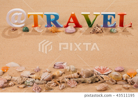 travel written in colorful letters on the beach travel written in colorful letters on the beach 43511195