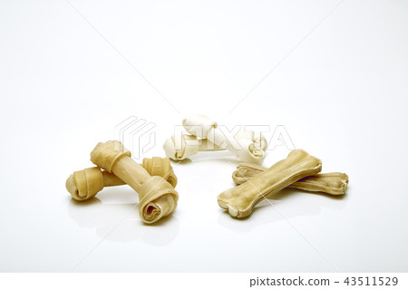 Dog bone white background Dog bone white background 43511529