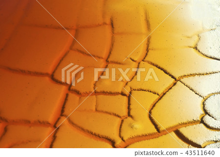 background, texture - rusty water on cracked clay background, texture - rusty water on cracked clay 43511640