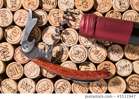 Elegant, already open corkscrew on vintage corks 43511947