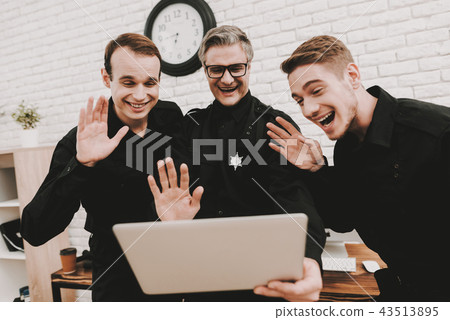 Smiling Police Officers Are Staring On Laptop. Smiling Police Officers Are Staring On Laptop. 43513895