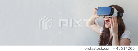 Woman using VR headset 43514206