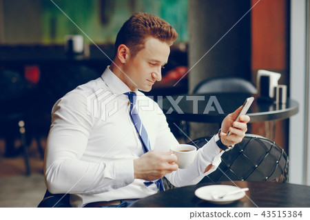 businessman with phone businessman with phone 43515384
