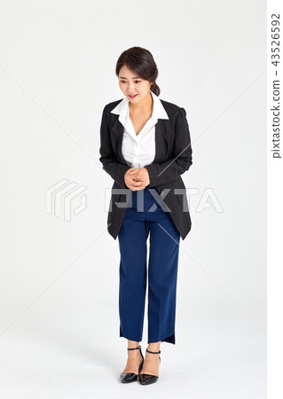 Twenty-year-old business woman wondering what is beneath her back, wondering 43526592