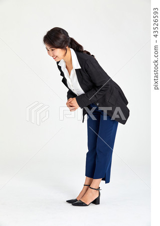 Twenty-year-old business woman wondering what is beneath her back, wondering 43526593