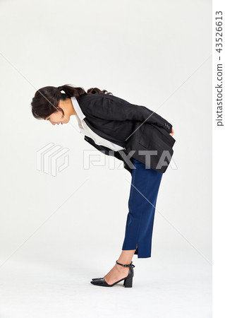 Twenty-year-old business woman wondering what is beneath her back, wondering 43526613