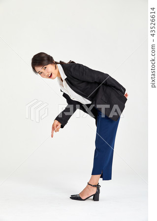 Twenty-year-old business woman wondering what is beneath her back, wondering 43526614