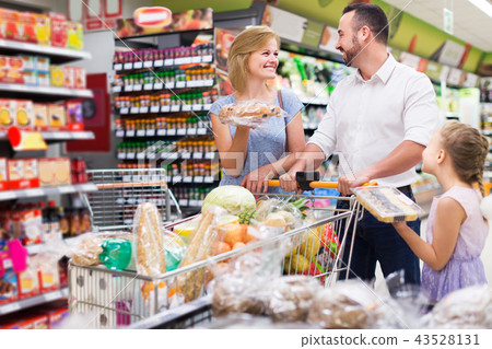 Family holding shopping 43528131