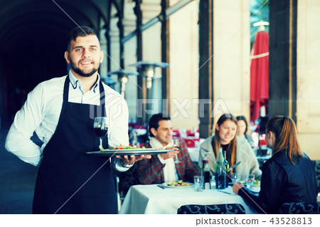 Portrait of waiter in restaurant Portrait of waiter in restaurant 43528813