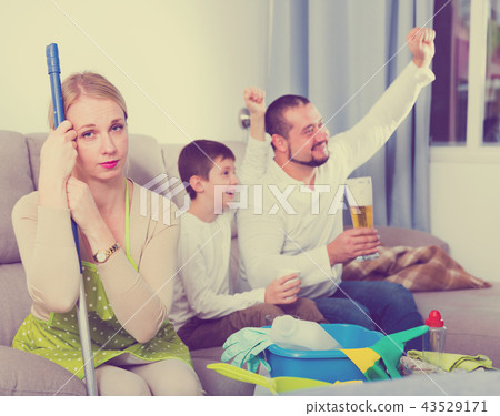 Tired woman with relaxing man with boy 43529171