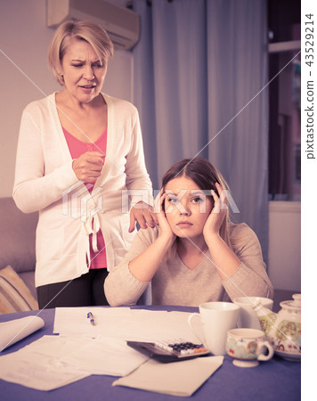 Mother scolds her adult daughter Mother scolds her adult daughter 43529214