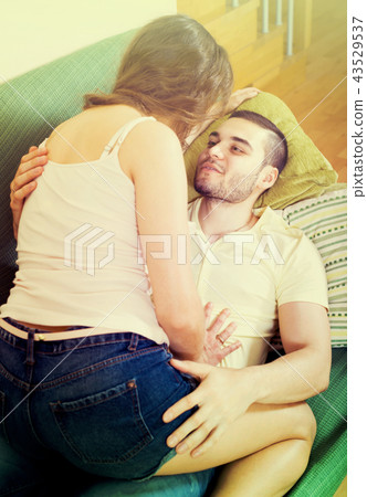 Adult couple on sofa in home 43529537