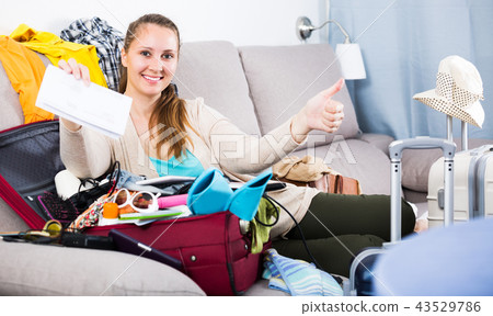 Woman getting ready for holidays 43529786