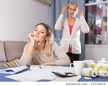 Mother scolds her adult daughter Mother scolds her adult daughter 43529810