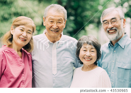 Smiling senior fellow Japanese male female 4 people outdoors 43530985