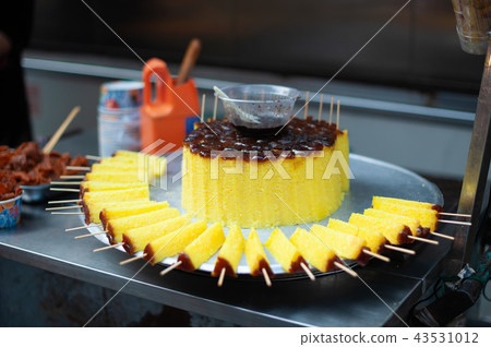 GuiHuaGao cake skewers in a street market 43531012
