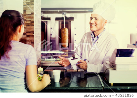 man chef taking order from customer 43531056