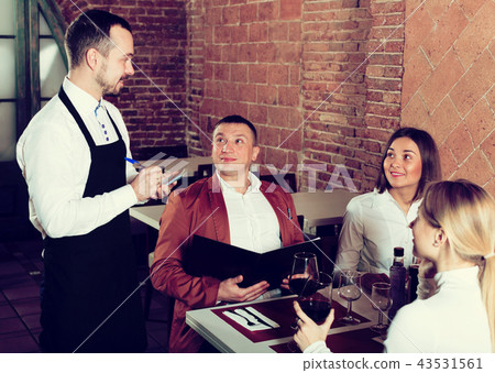 Male waiter writing down order 43531561