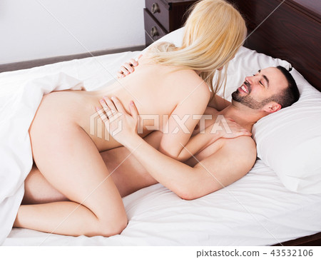 Couple making love in bedroom Couple making love in bedroom 43532106