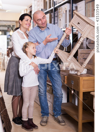 Family is choosing new curbstone Family is choosing new curbstone 43533549