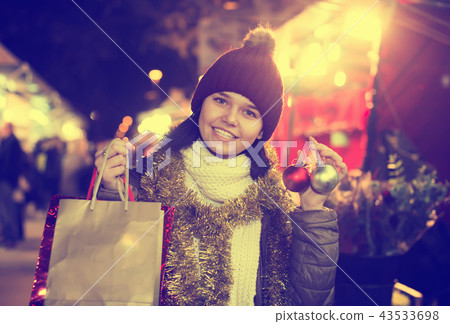 Portrait of young happy girl at Christmas fair 43533698