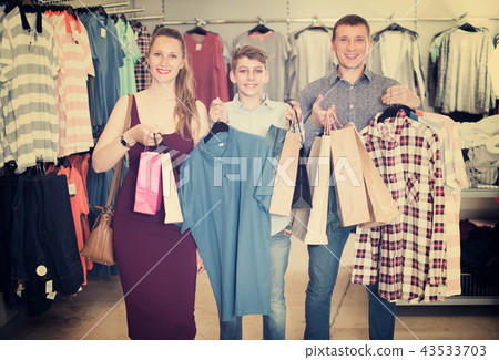Family with purchases in shop Family with purchases in shop 43533703
