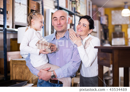 Family is choosing new furniture 43534489