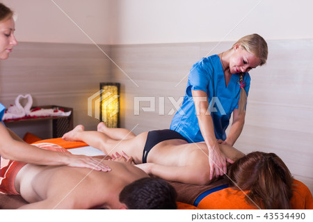 Portrait of young female who is doing relaxation massage to her clients Portrait of young female who is doing relaxation massage to her clients 43534490