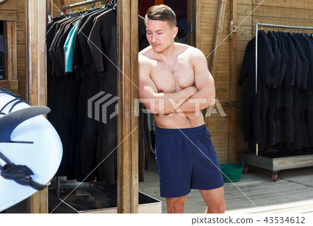 Man near surf outfit rental 43534612