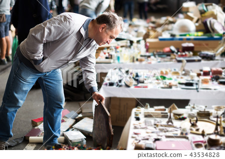 Male visiting old things market Male visiting old things market 43534828