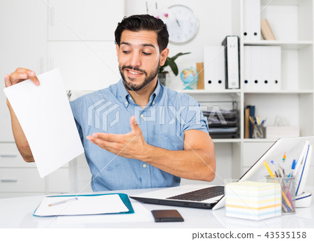 Smiling man is talking about contract Smiling man is talking about contract 43535158