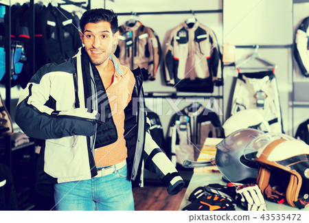 Man trying up moto jacket Man trying up moto jacket 43535472