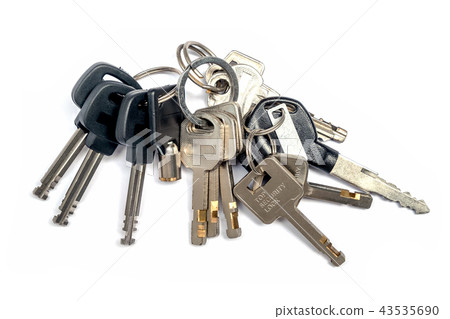 Bunch of Many Keys Lies on an iSolated White. 43535690