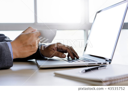 man of business man hand working on laptop man of business man hand working on laptop 43535752