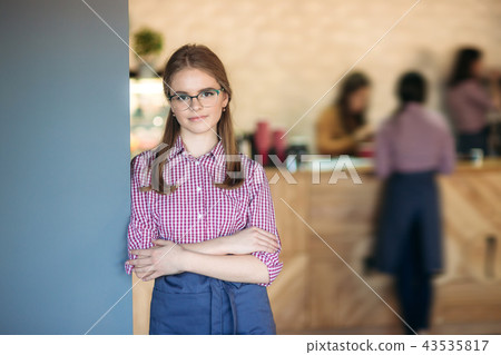 Beautiful waitress standing in cafe. waiting for customer 43535817