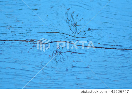old wooden board blue color with cracks branches 43536747