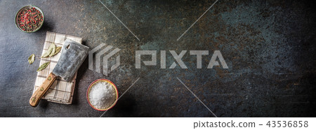Old meat butcher on dark concrete board Old meat butcher on dark concrete board 43536858