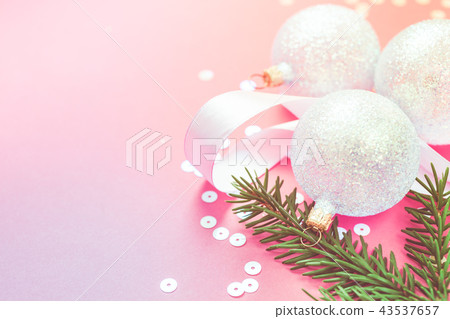 Christmas pearl decoration balls pink background Christmas pearl decoration balls pink background 43537657