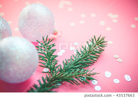 Christmas pearl decoration balls pink background Christmas pearl decoration balls pink background 43537663