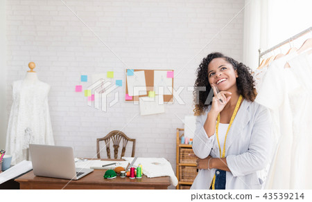 Young fashion designer thinking new ideas. 43539214