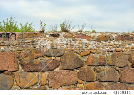 Old stone wall. Old stone wall. 43539315