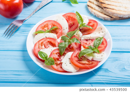 Caprese salad with mozzarella Caprese salad with mozzarella 43539500