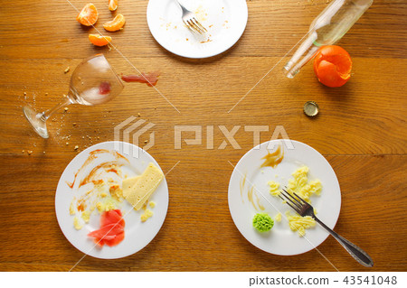 Messy table after party. Leftover food,   43541048