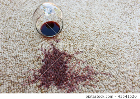 glass of red wine fell on carpet, wine spilled  43541520