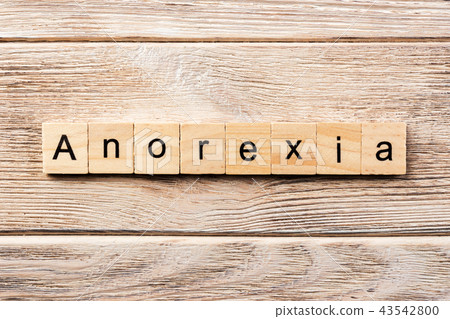 anorexia word written on wood block. anorexia word written on wood block. 43542800