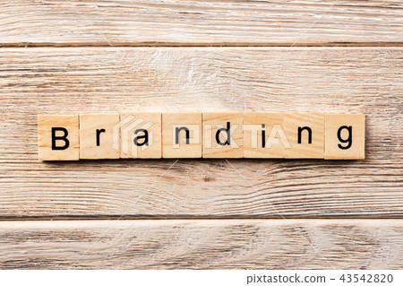 branding word written on wood block. branding word written on wood block. 43542820