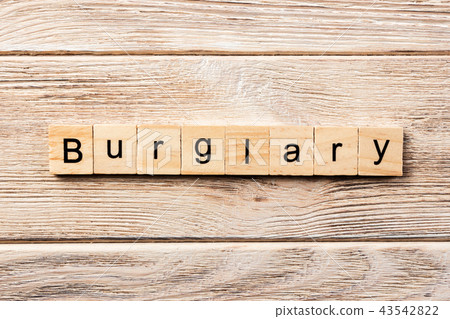 burglary word written on wood block. burglary word written on wood block. 43542822